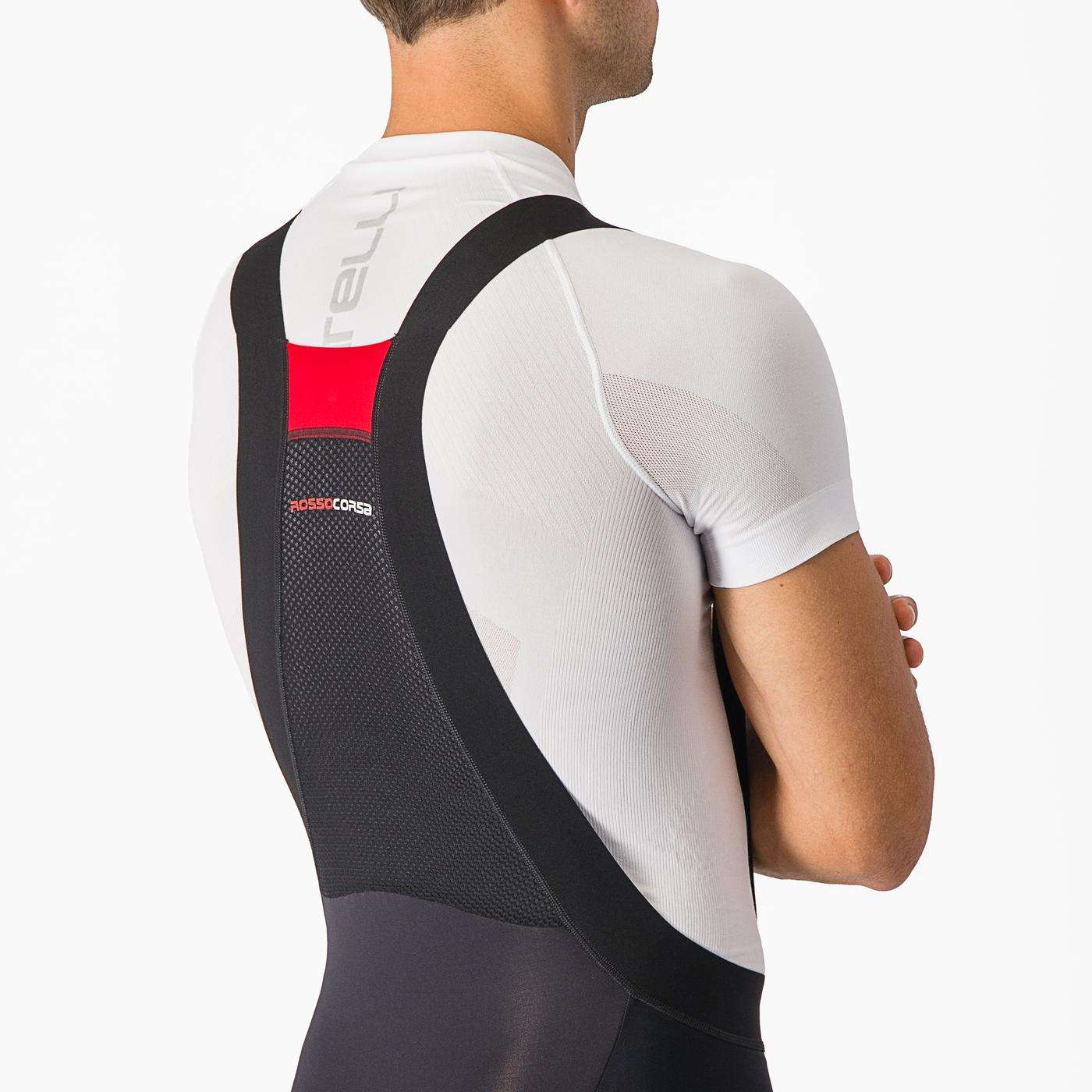 Castelli overtaking Ros 2024 dungarees